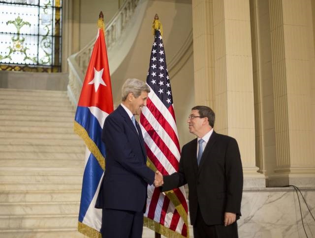 Secretary of State John Kerry shakes hands with Cuban Foreign Minister Bruno Rodriguez prior to their meeting at the Foreign Ministry in Havana, Cuba, Friday, Aug. 14, 2015. Kerry traveled to the Cuban capital to raise the U.S. flag and formally reopen the long-closed U.S. Embassy. Pablo Martinez Monsivais/AP